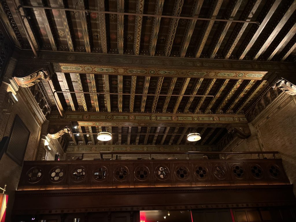 Photograph of the loft seating and ceiling in the NYC bar The Campbell.